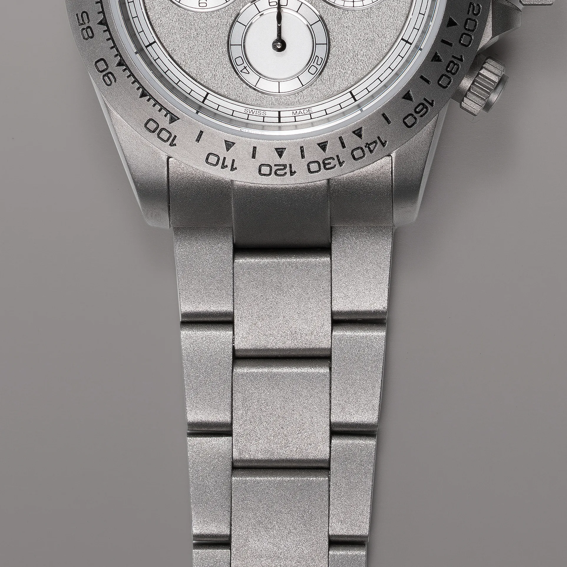 Titanium bespoke chronograph with grained dial and diamond-polished angles — Alter Geneva, hand-finished in Switzerland